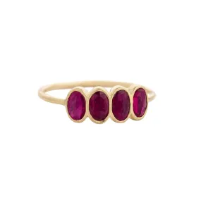 Gold Bezel-Set Ring with Four Rubies